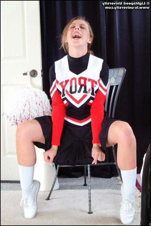 20P Pictures of a cheerleader stripping