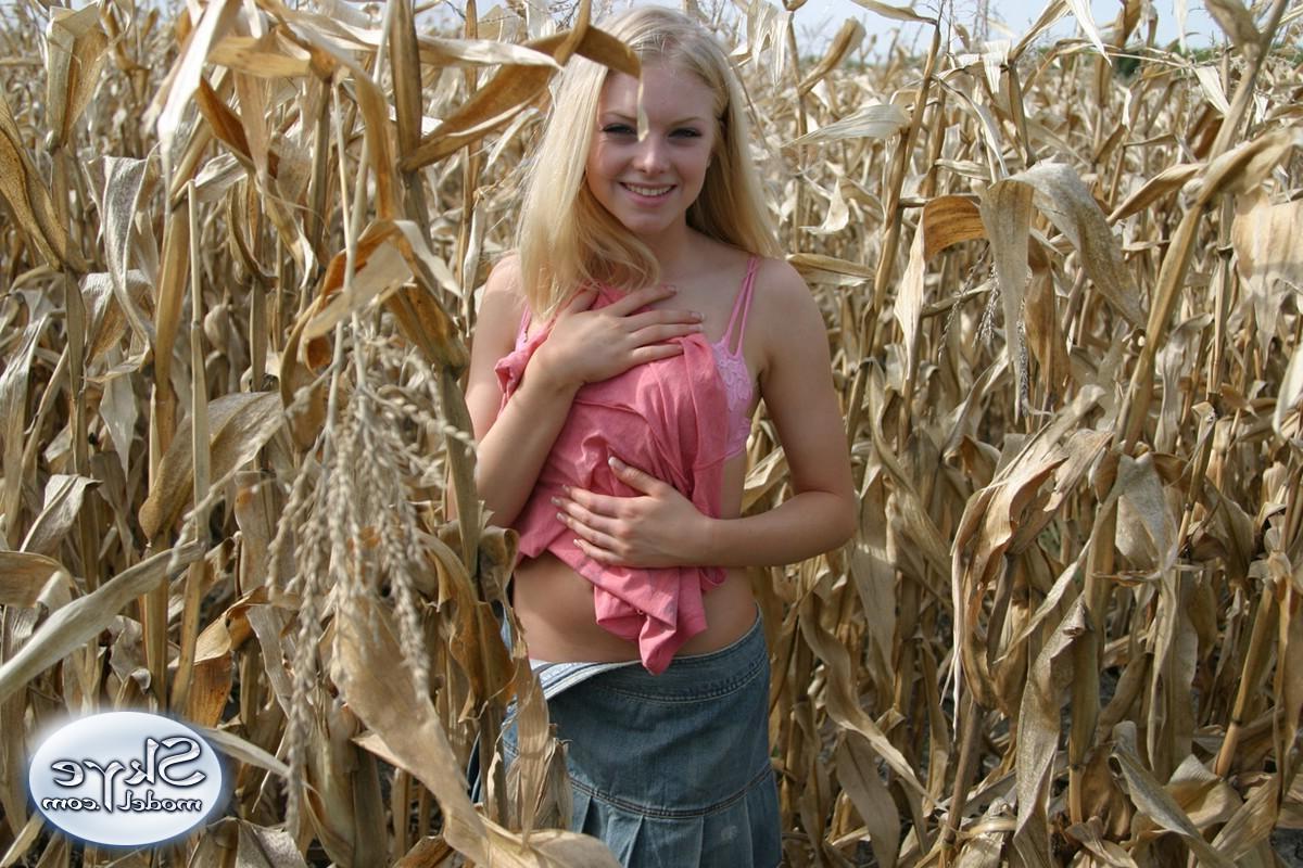 12P Blonde tease Skye Model lifts her skirt and shows her ass in a tiny thong