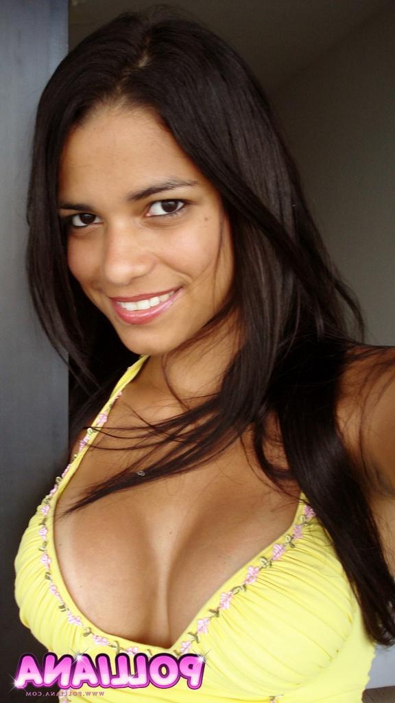 15P Latina Polliana's tits pop out of low cut yellow top