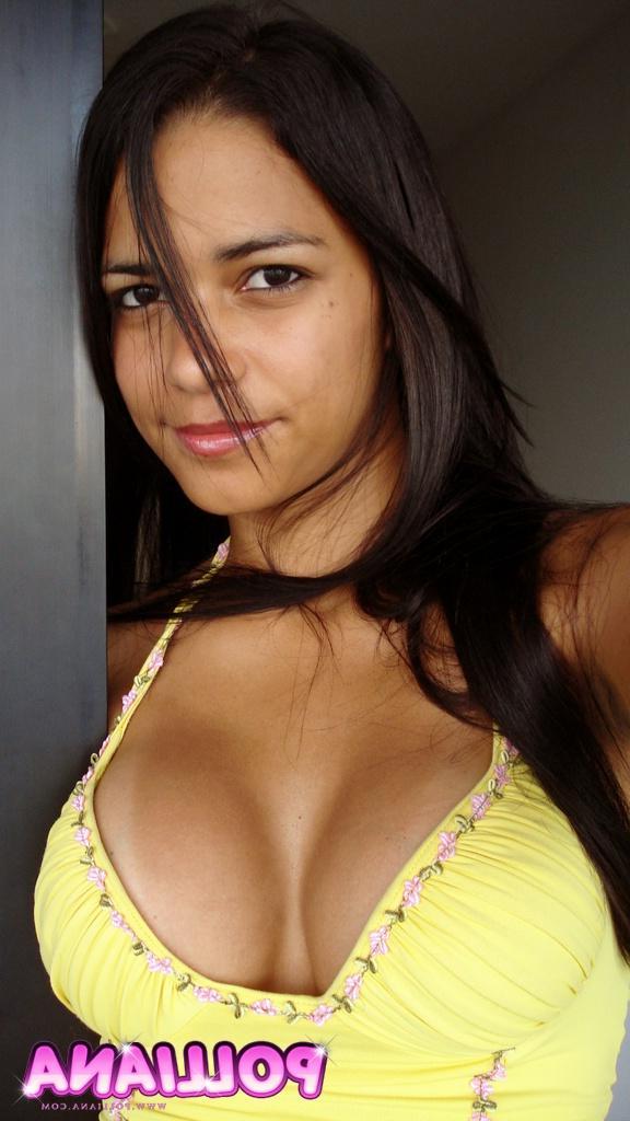 15P Latina Polliana's tits pop out of low cut yellow top