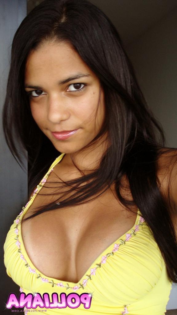 15P Latina Polliana's tits pop out of low cut yellow top