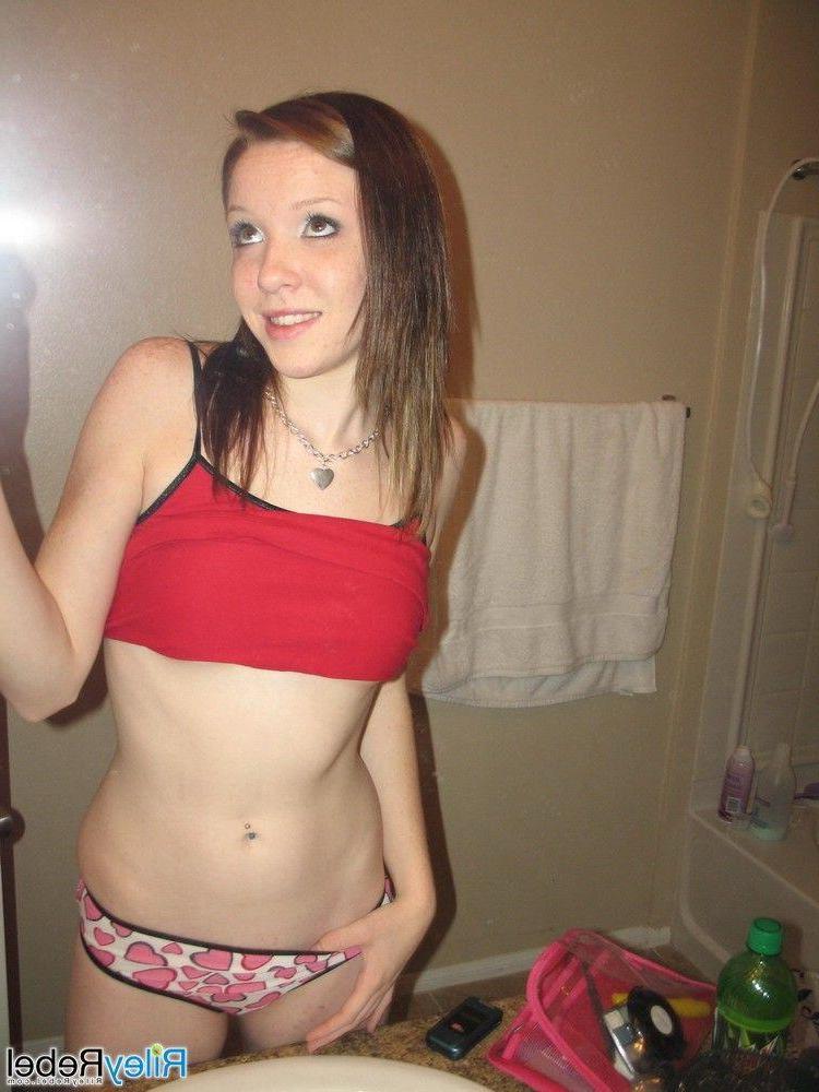 20P Pictures of Riley Rebel taking hot pics of herself in the bathroom