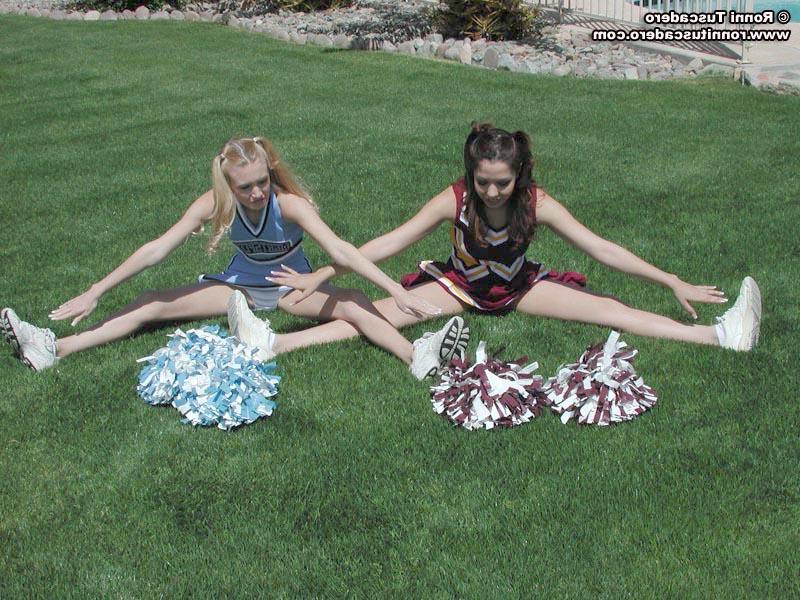20P Pictures of two teen cheerleaders practicing their moves outside