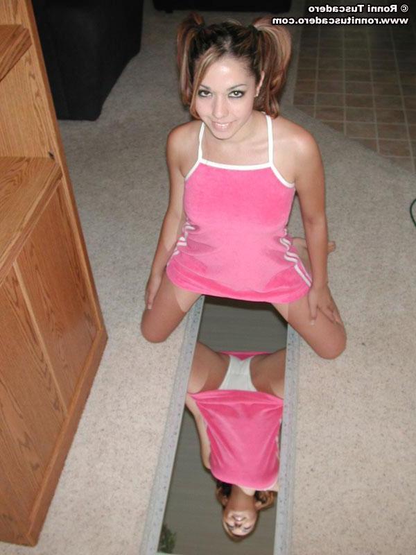 20P Pictures of Ronni Tuscadero playing with a mirror