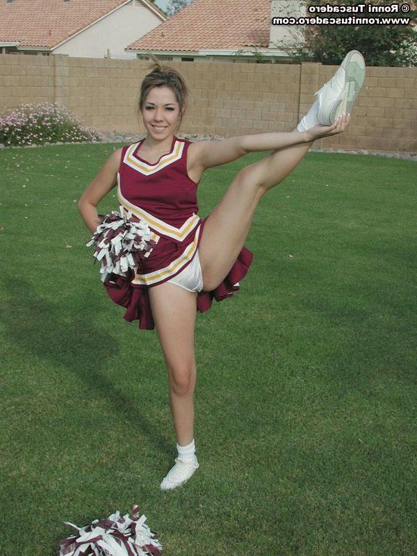20P Pictures of a hot teen cheerleader stripping outside