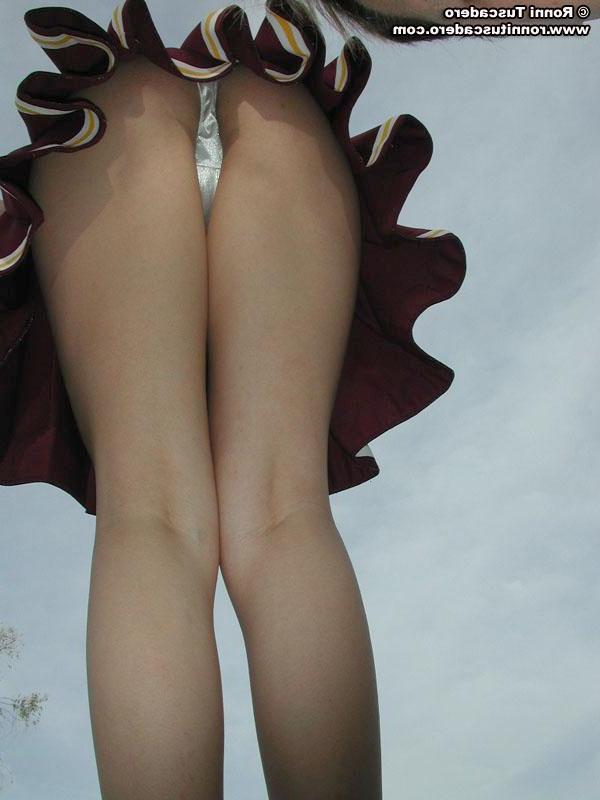 20P Pictures of a hot teen cheerleader stripping outside