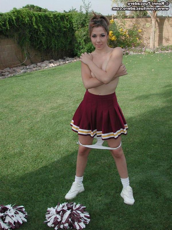 20P Pictures of a hot teen cheerleader stripping outside