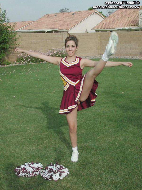 20P Pictures of a hot teen cheerleader stripping outside
