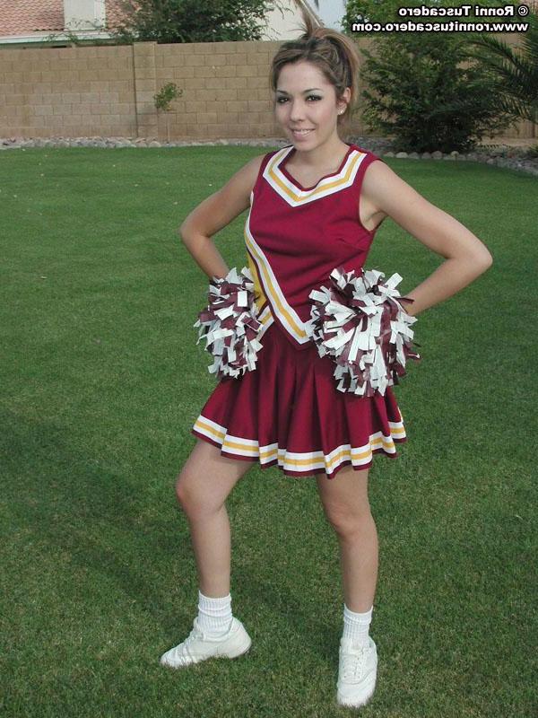 15P Hot cheerleader takes off her clothes