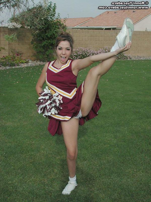 15P Hot cheerleader takes off her clothes