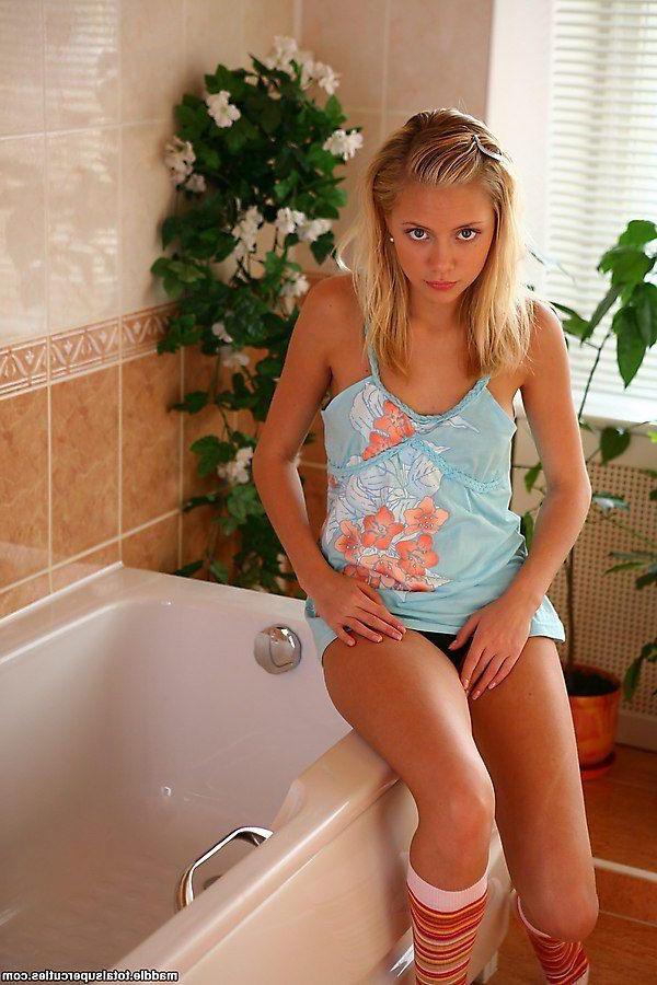 20P Pictures of Maddie giving your cock a tease in the bathroom