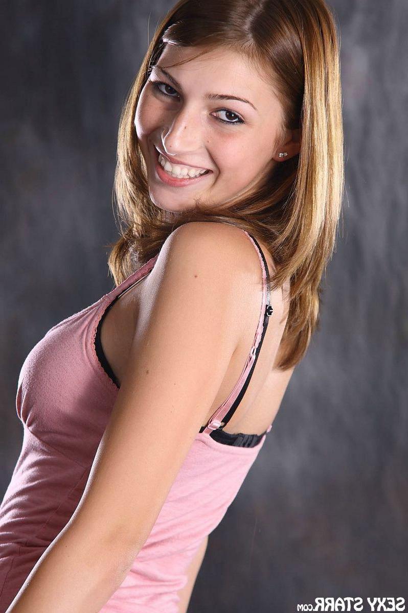16P Pictures of teen chick Sexy Starr showing you her round perky boobs