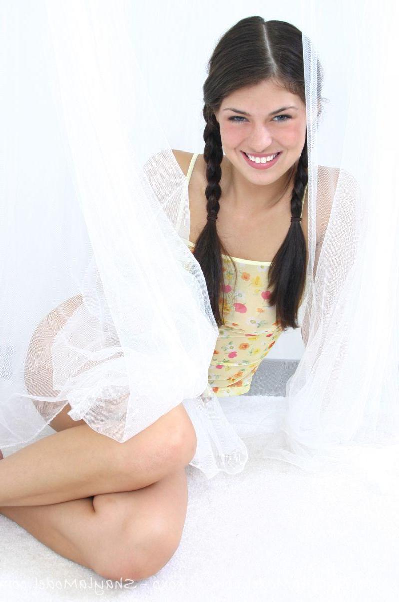 20P Pictures of teen chick Shayla Model being a cocktease in pigtails