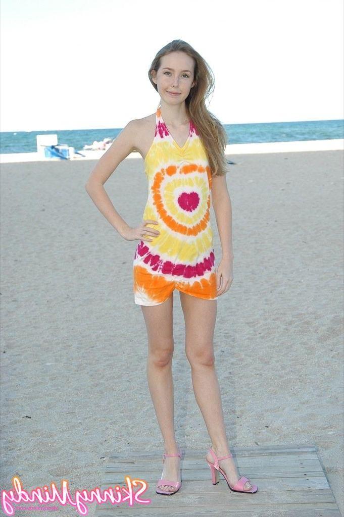 20P Pictures of Skinny Mindy hanging out in a bikini