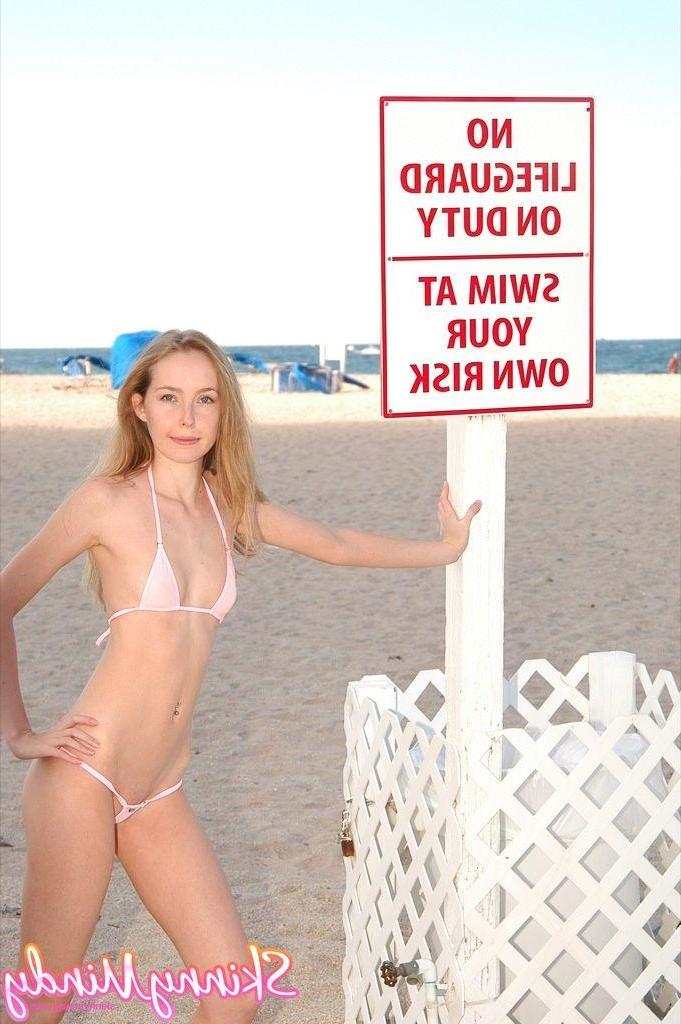20P Pictures of Skinny Mindy hanging out in a bikini