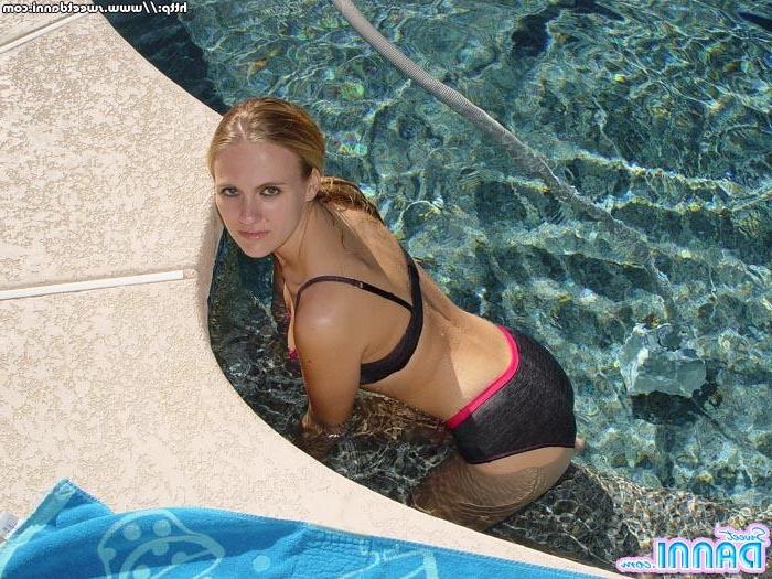 15P Pictures of teen model Sweet Danni hanging out by the pool