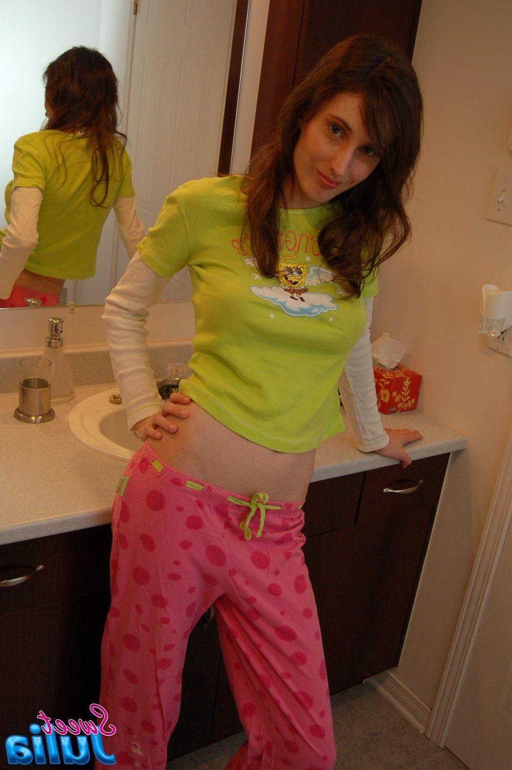 12P Pictures of Sweet Julia getting naked in the bathroom