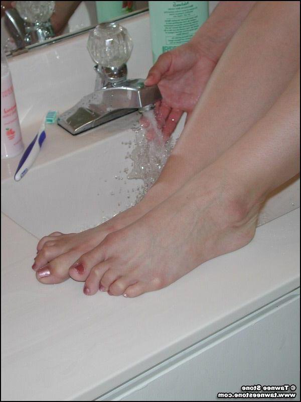 20P Pictures of Tawnee Stone getting naked in the bathroom