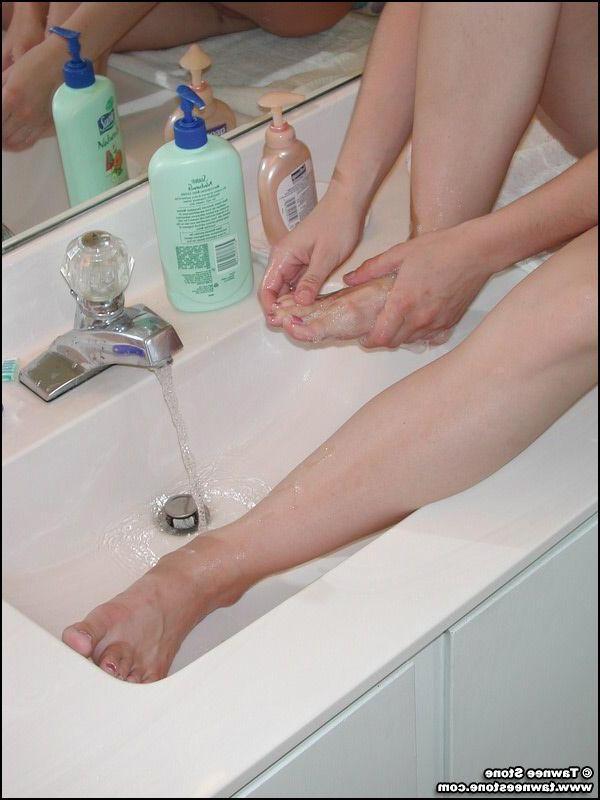 20P Pictures of Tawnee Stone getting naked in the bathroom