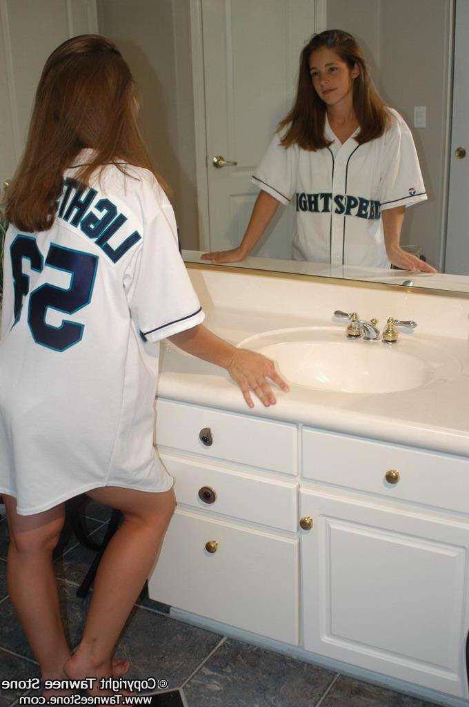 20P Pictures of Tawnee Stone getting naked in the bathroom