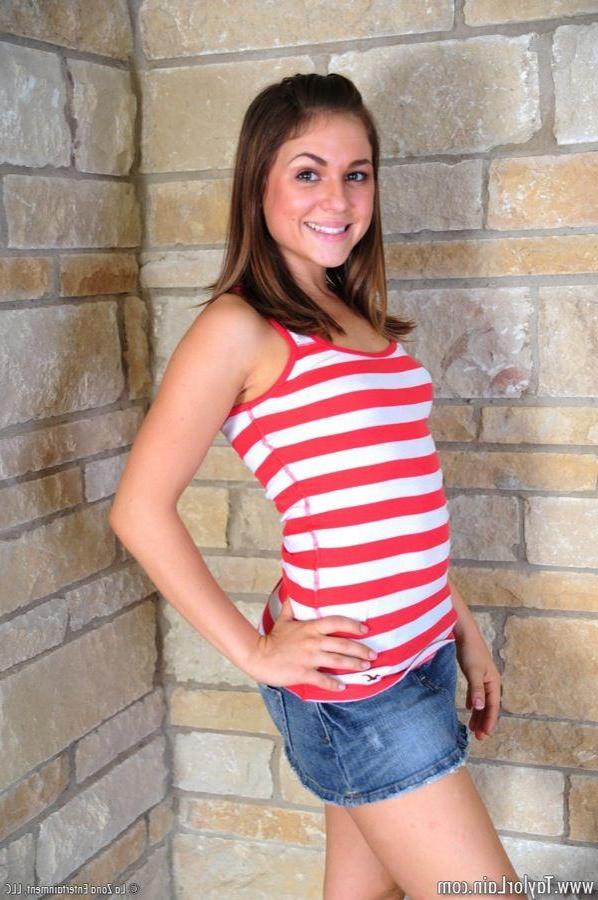 15P Pictures of teen model Taylor Lain getting naked in front of the camera