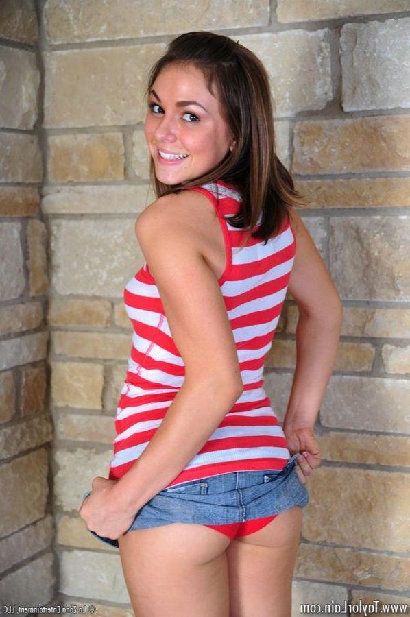 15P Pictures of teen model Taylor Lain getting naked in front of the camera