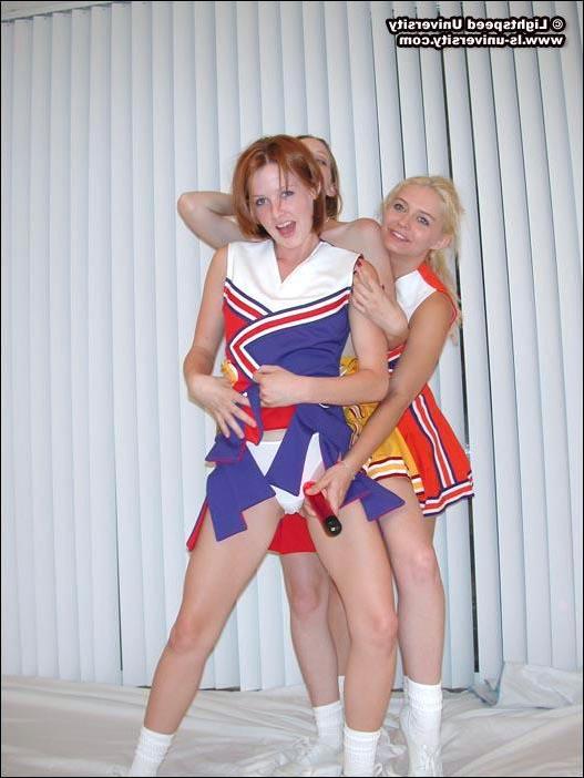 16P Pics of horny cheerleaders undressing each other