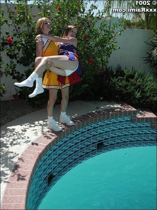 17P Pictures of two teen cheerleaders being naughty in the pool