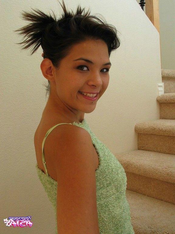 17P Pictures of teen model Teenage Asia teasing on the stairs