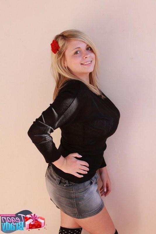 16P Pictures of Tegan Brady wearing a tight bikini top