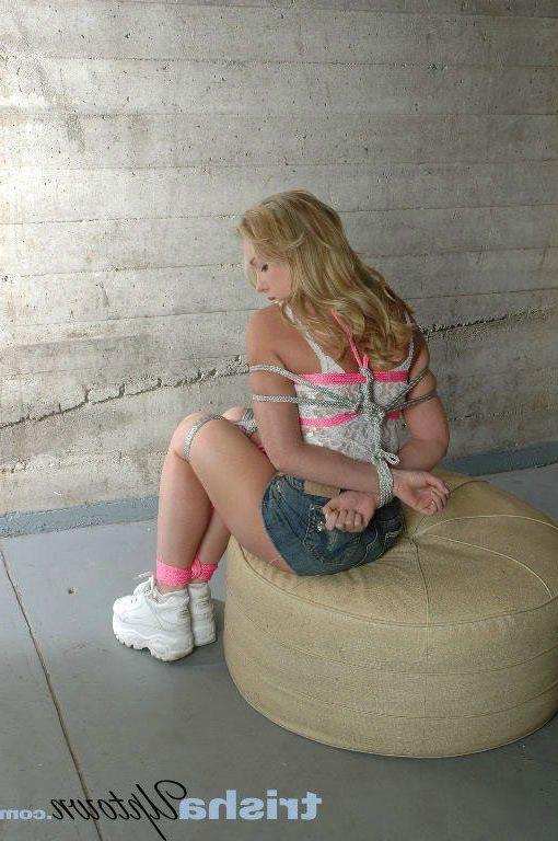 20P Pictures of teen chick Trisha Uptown tied up and ready for you