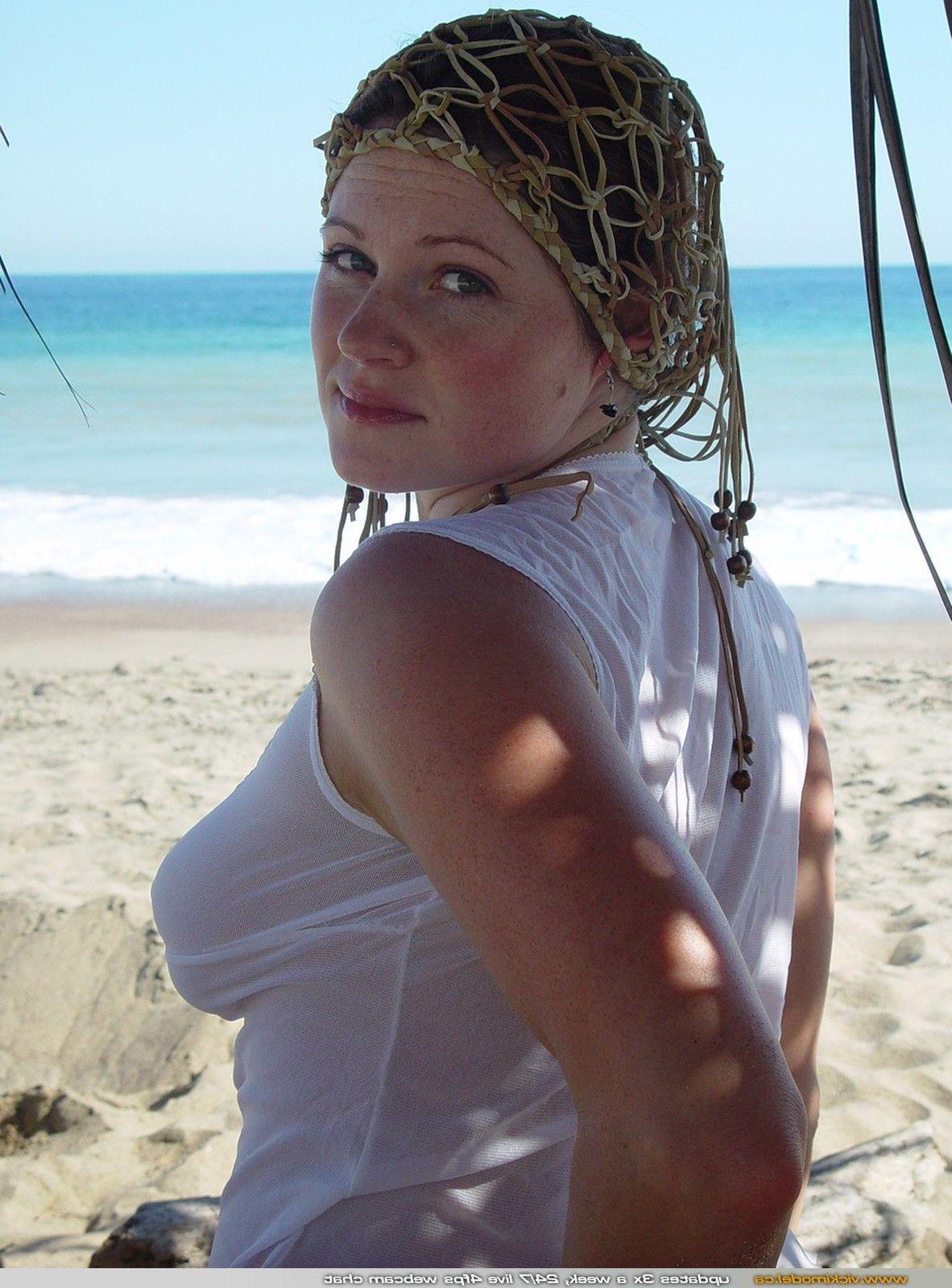 20P Pictures of teen cutie Vicki Model showing her boobies