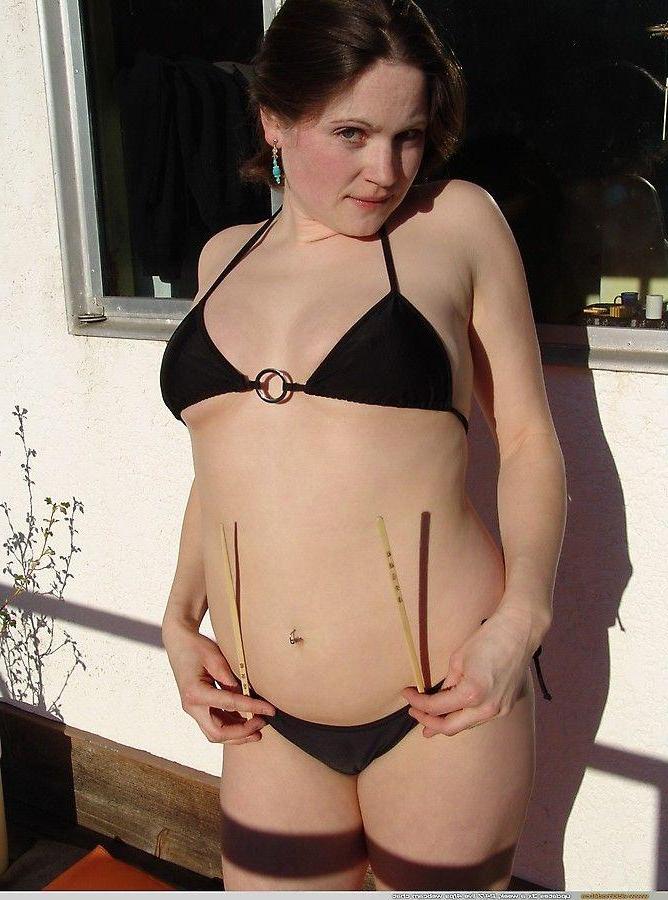 20P Pictures of teen Vicki Model showing her tits