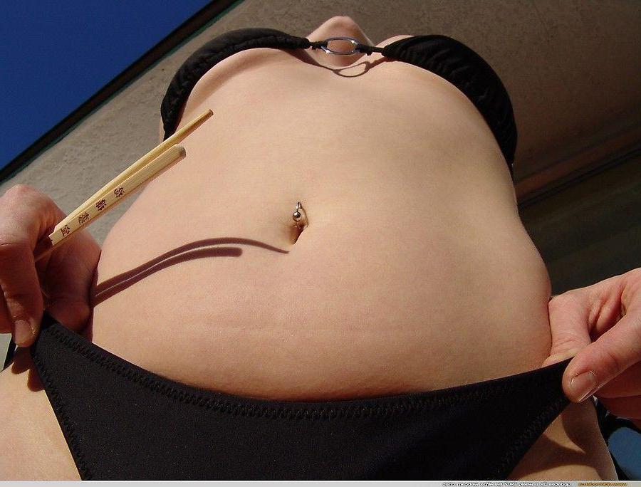 20P Pictures of teen Vicki Model showing her tits