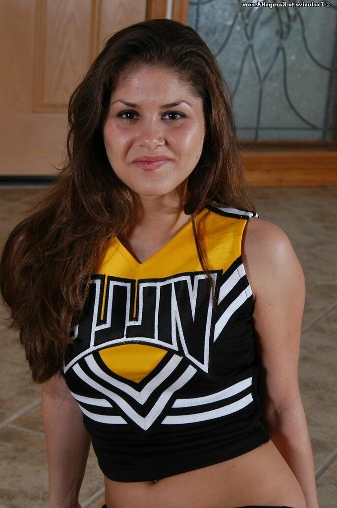 16P Stunning brunette girl Cheerleader shows it all off