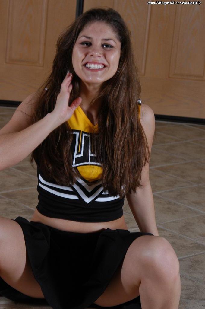 16P Stunning brunette girl Cheerleader shows it all off