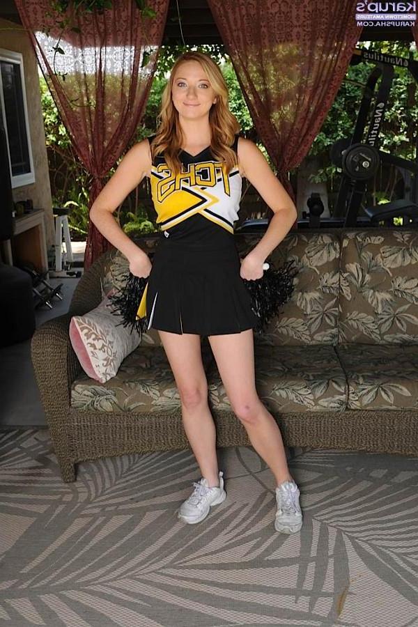 15P Strawberry blonde cheerleader Indiana Jane strips naked