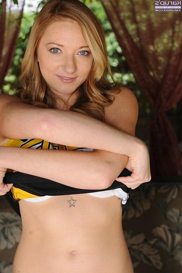 15P Strawberry blonde cheerleader Indiana Jane strips naked