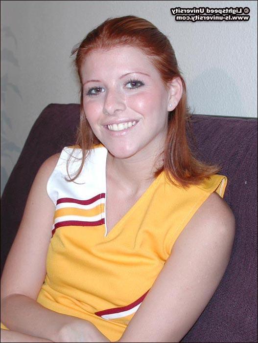 20P Pics of a hot redhead cheerleader getting naked for you