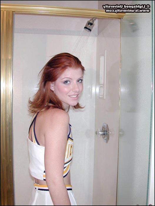 20P Pictures of a redhead cheerleader getting all wet