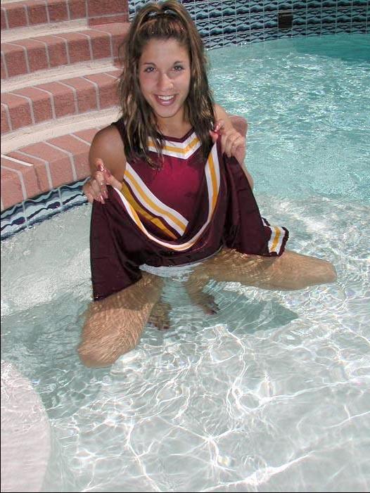 20P Pictures of a cheerleader swimming in her uniform