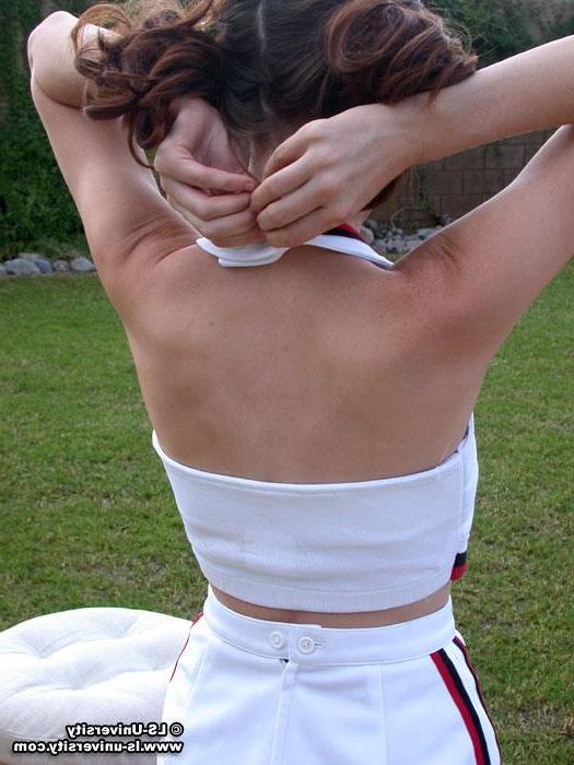 20P Pictures of a hot cheerleader stripping in the backyard