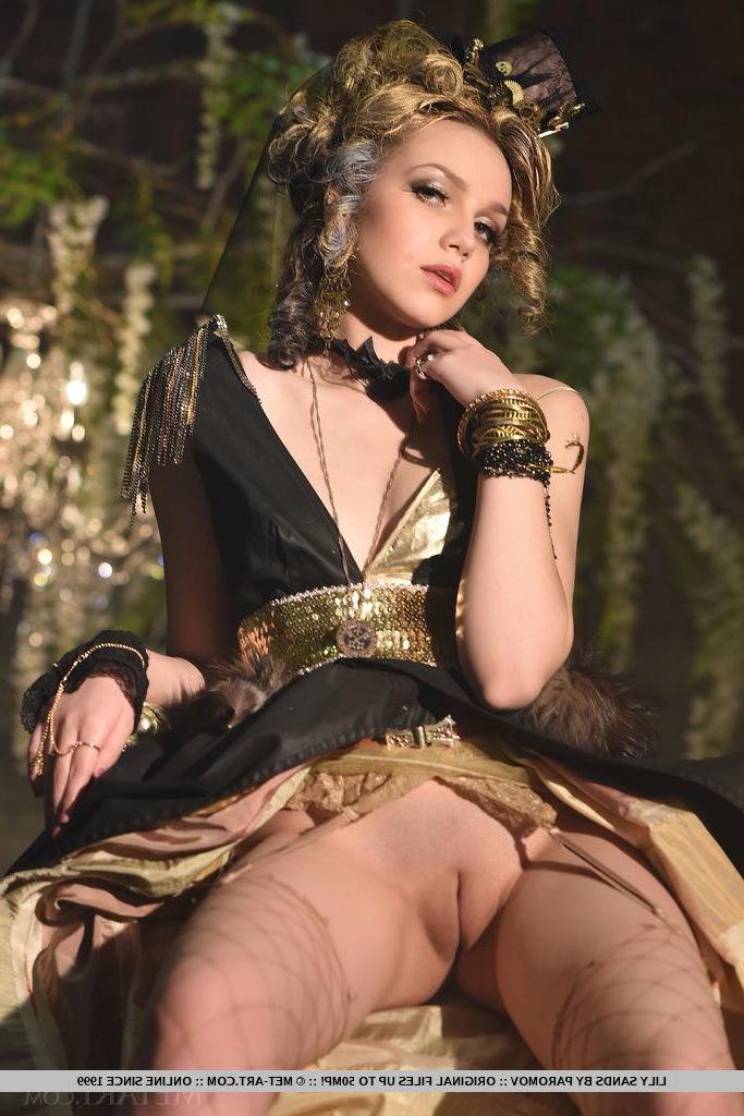 18P Pretty girl Lily Sands strips out of her mask and makeup in a fantasy set