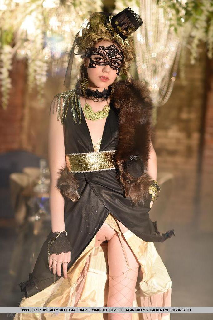 18P Pretty girl Lily Sands strips out of her mask and makeup in a fantasy set