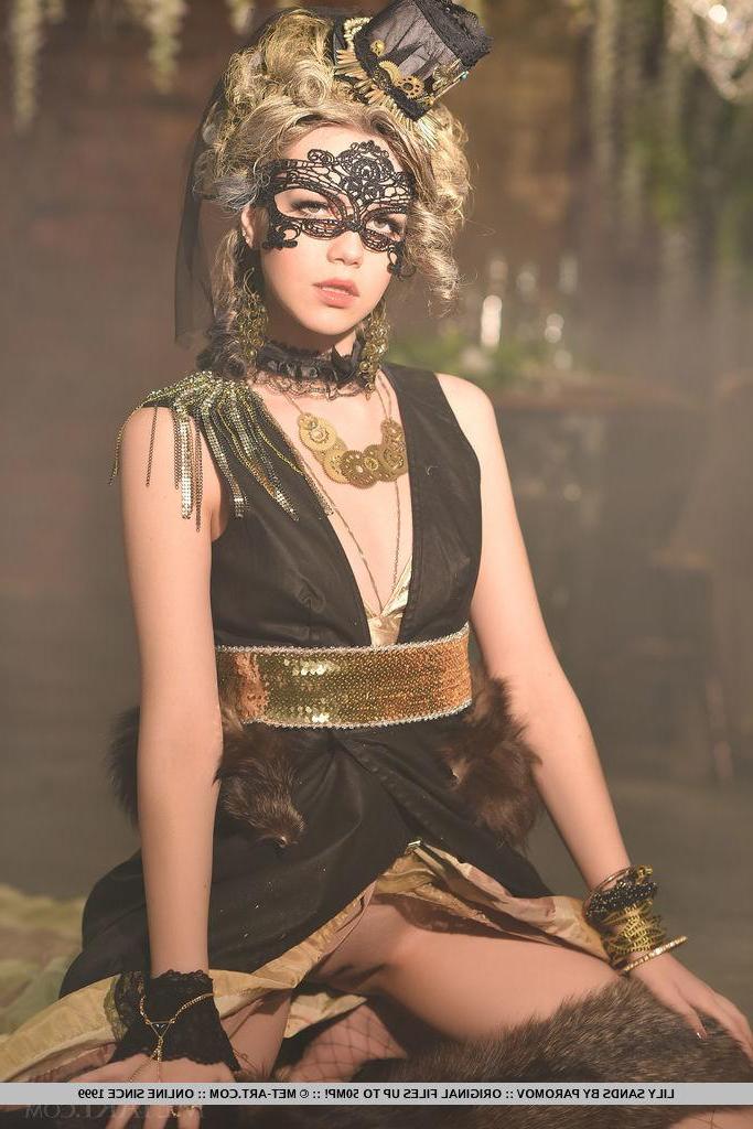 18P Pretty girl Lily Sands strips out of her mask and makeup in a fantasy set