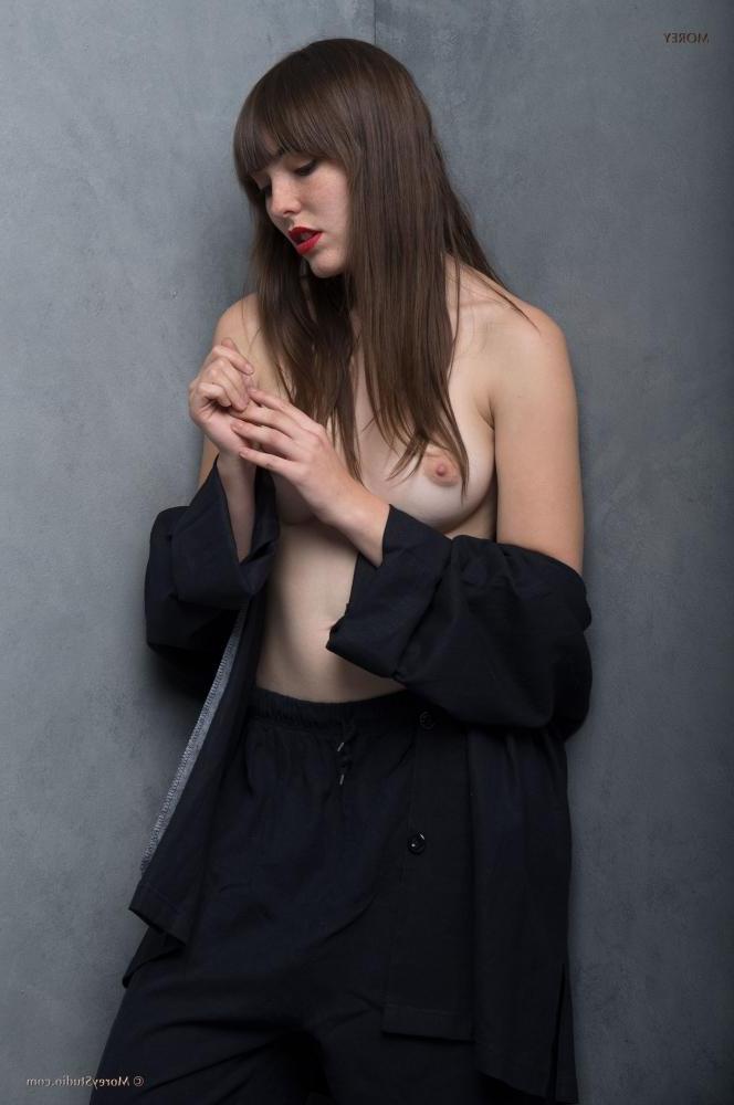 11P Art model Emmy exposes her perky breasts in the studio