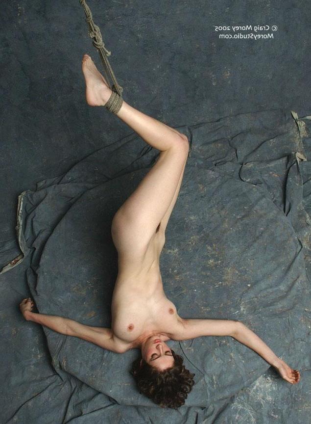 11P Brunette model Helena displays her nude body in the studio