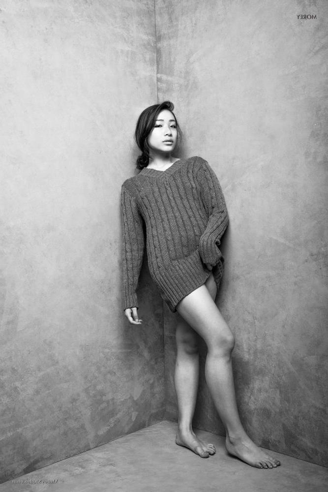 11P Brunette model Meiko poses in black and white