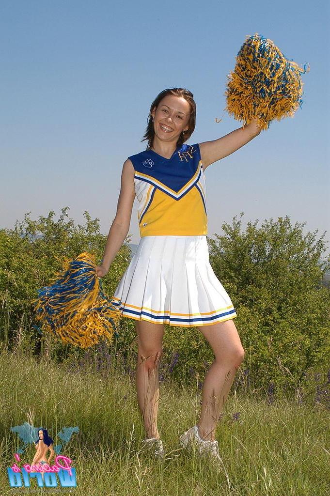 20P Cheerleader toys her pussy outside