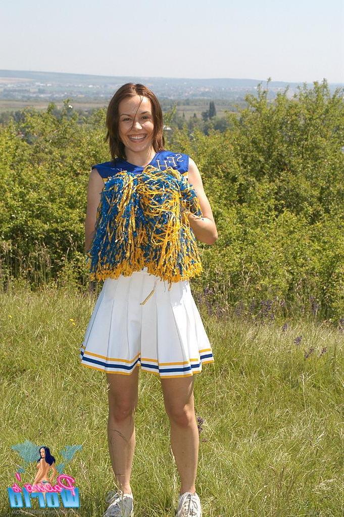 20P Cheerleader toys her pussy outside
